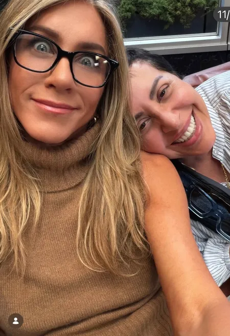 Jennifer Aniston's Neutral Sleeveless Turtleneck