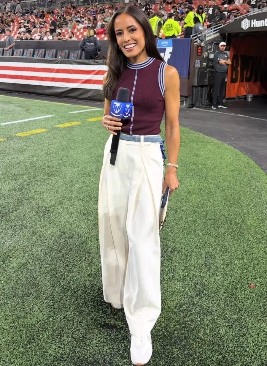 Kaylee Hartung's Game Day White Pants And Sleeveless Top