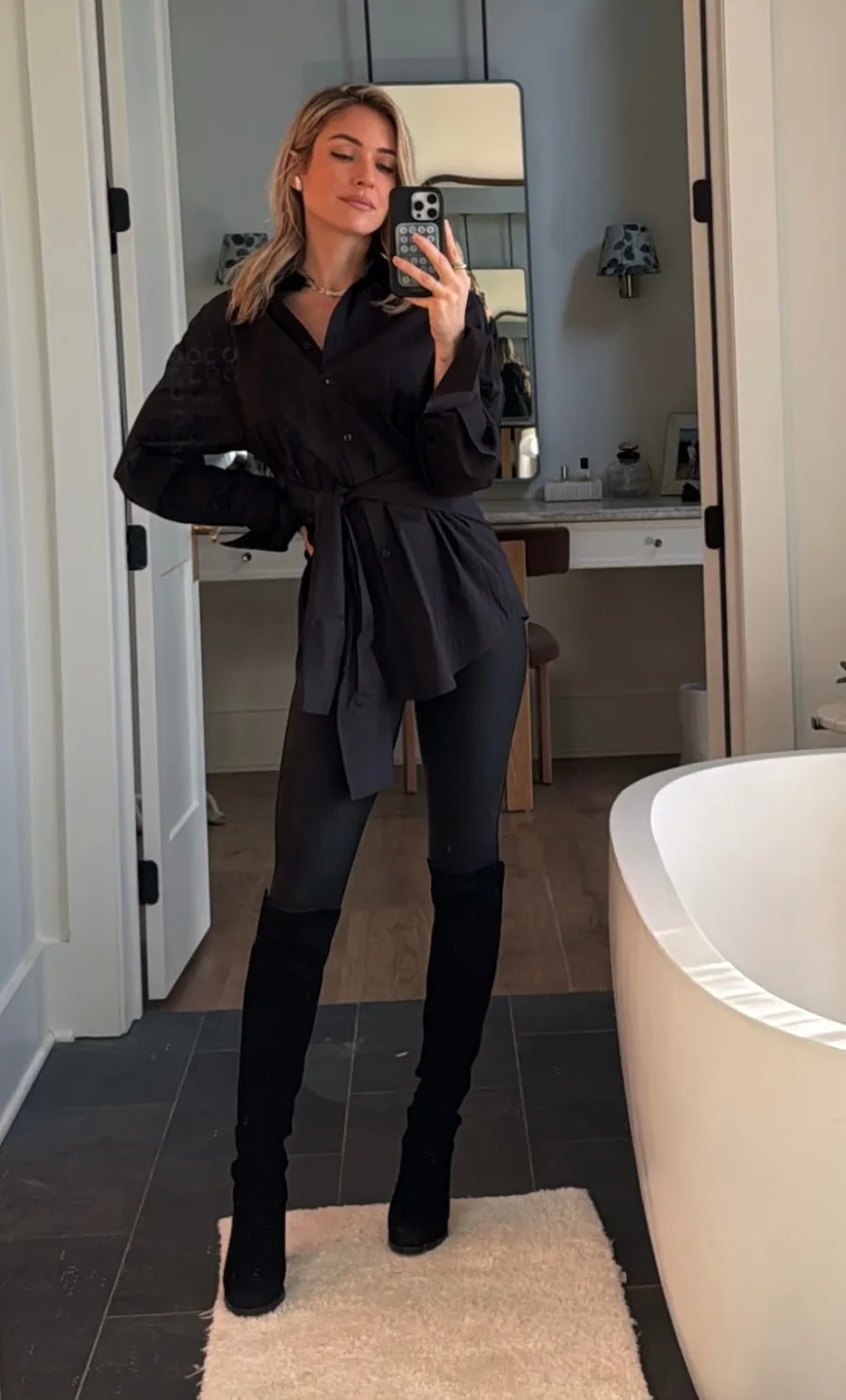 Kristin Cavallari's Black Poplin Top, Leggings and Suede Boots