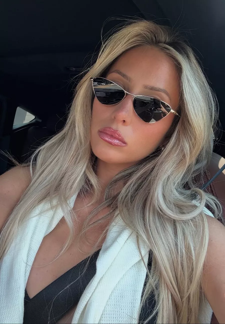 Alix Earle's Sunglasses, Lip Gloss And Lip Liner