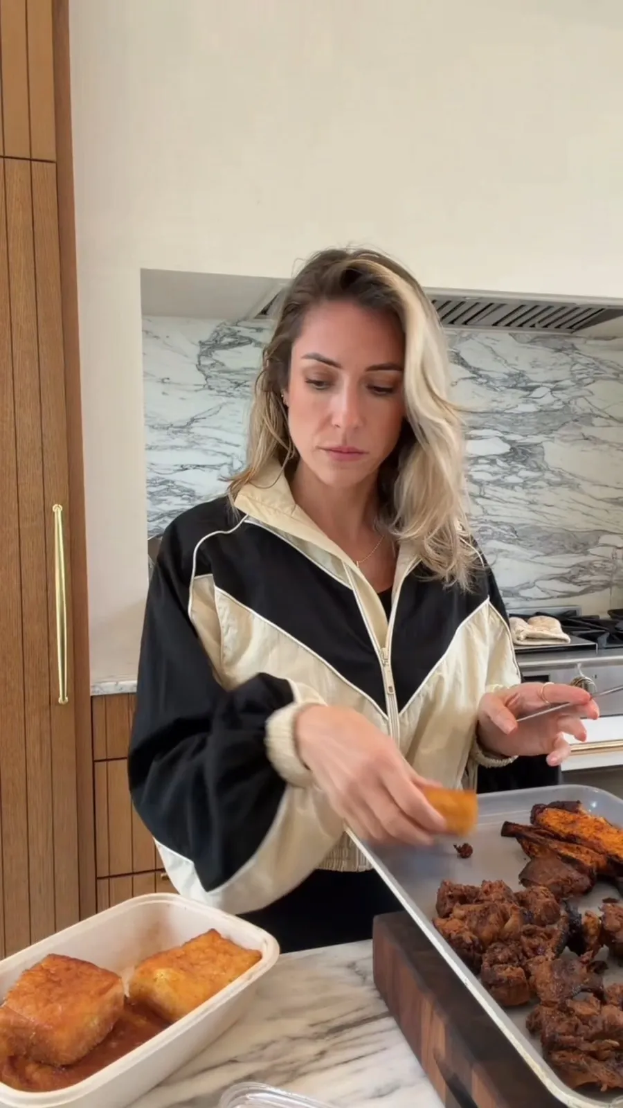 Kristin Cavallari's Beige And Black Bomber Tech Jacket