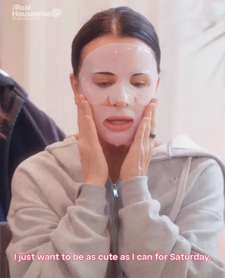 Kyle Richards' Face Mask And Hoodie