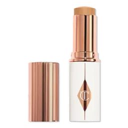 Shop Charlotte Tilbury Unreal Skin Sheer Glow Tint Hydrating Foundation Stick - 9 Tan | Ulta