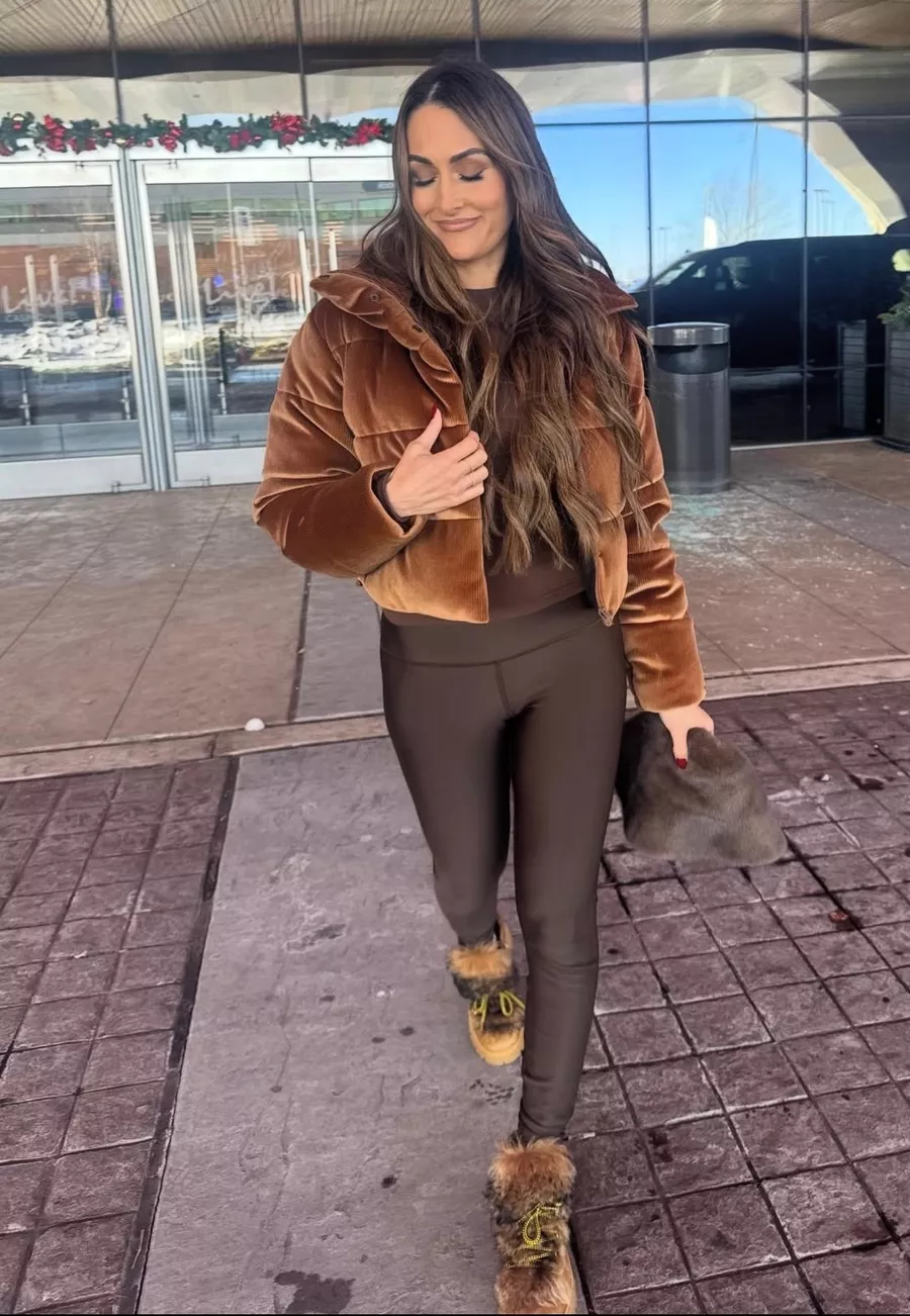 Shop Nikki Bella's Puffer, Leggings And Shearling Boots